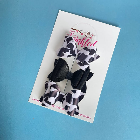 Cowprint Leather Bows